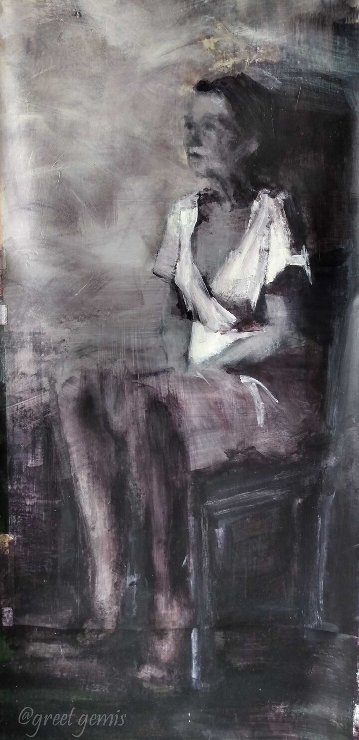 Zittende vrouw